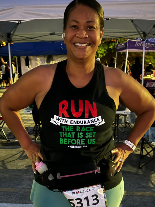 Runner in black Run with Endurance Racerback Tank