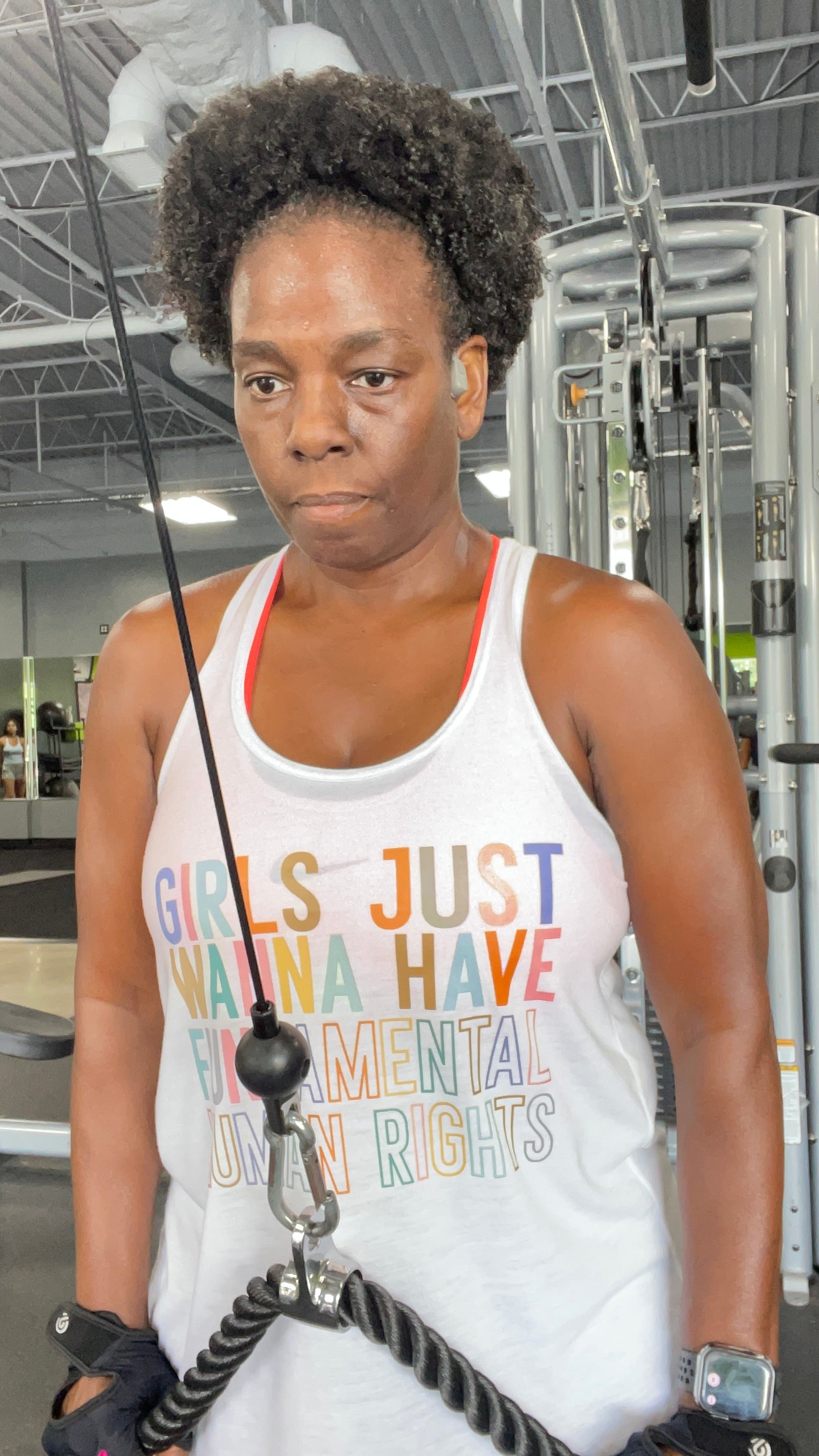 Black girl workout in a white Girls just Wanna Have Fundamental Human Rights fitness tank top.