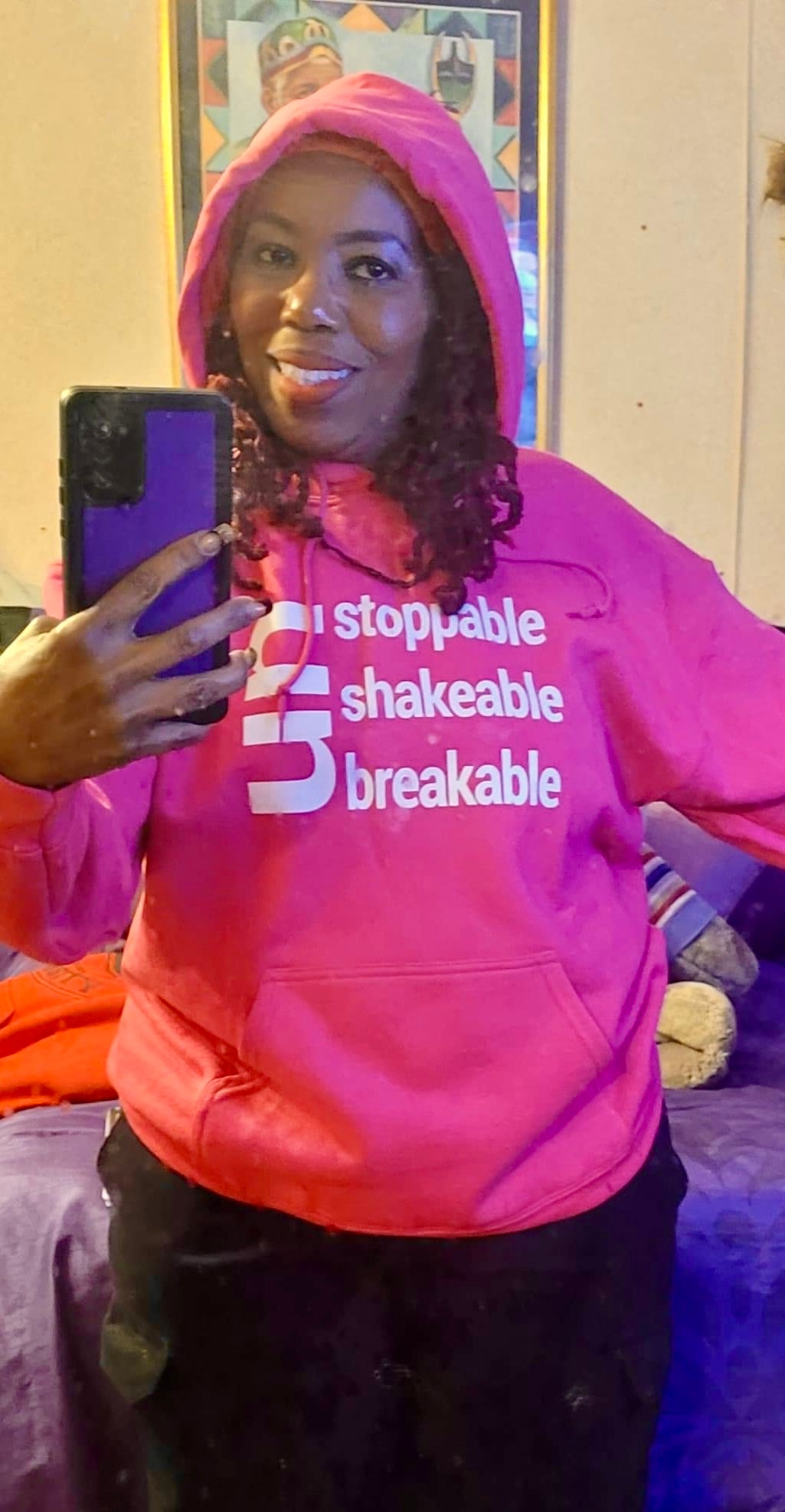 A woman wearingUnstoppable Unshakable Unbreakable Hoodie - pink