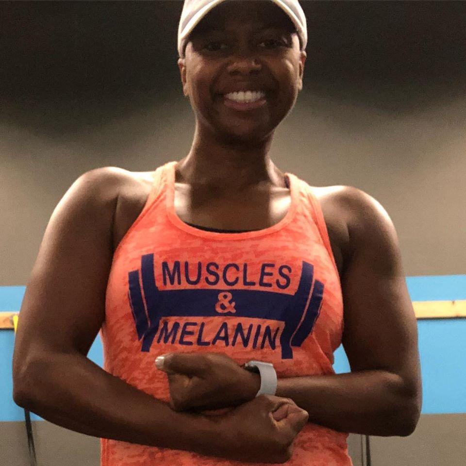 Muscles & Melanin Tank Top on girl weight lifter 